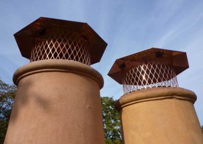 Two Terracotta Flues with Copper Chimney Caps