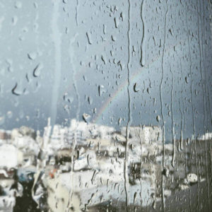 rainbow outside a window