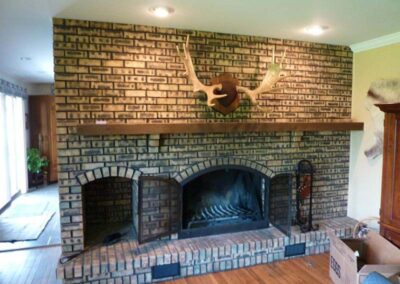 dark brick and dark mortar fireplace facing