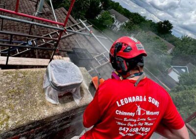 Technician working on chimney chase